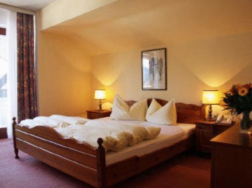 Posteľ alebo postele v izbe v ubytovaní Hotel Mooserkreuz