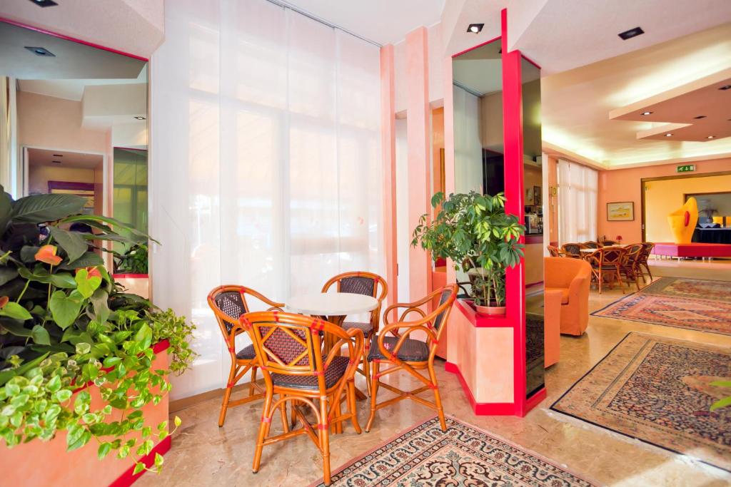 Posezení v ubytování Hotel Catto Suisse