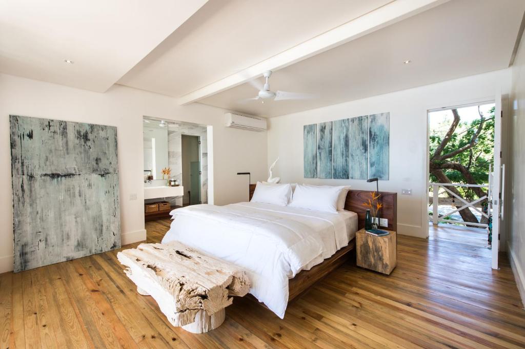 Postel nebo postele na pokoji v ubytování Ibagari Boutique Hotel