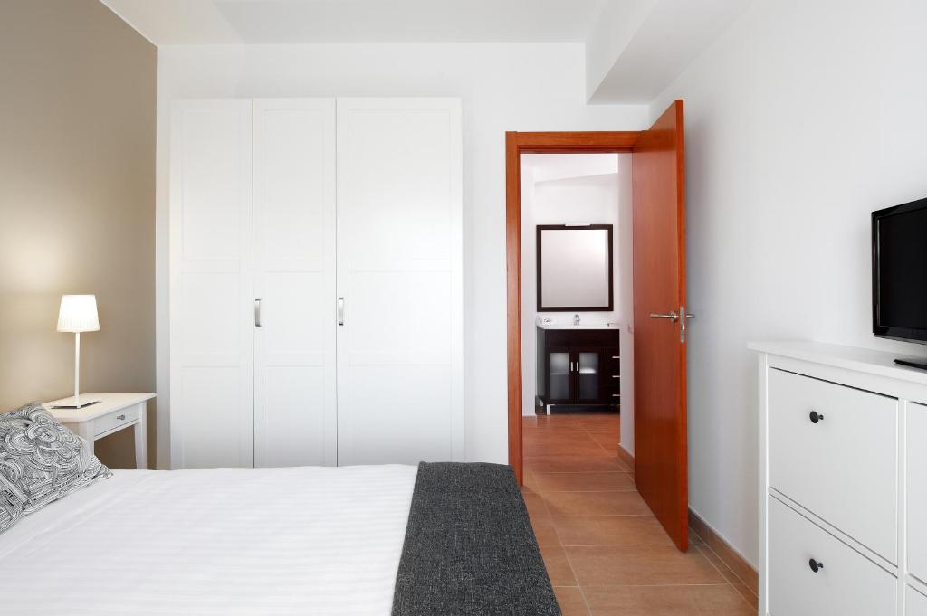 Posteľ alebo postele v izbe v ubytovaní Barcelona Apartment Gran de Gràcia