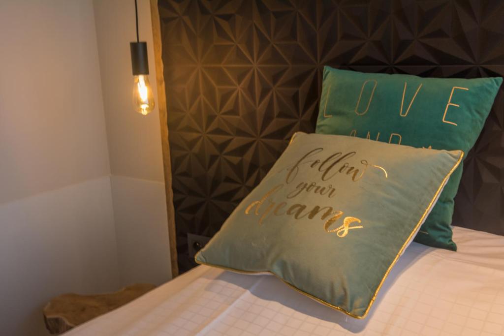 Postel nebo postele na pokoji v ubytování Hotel Shamrock