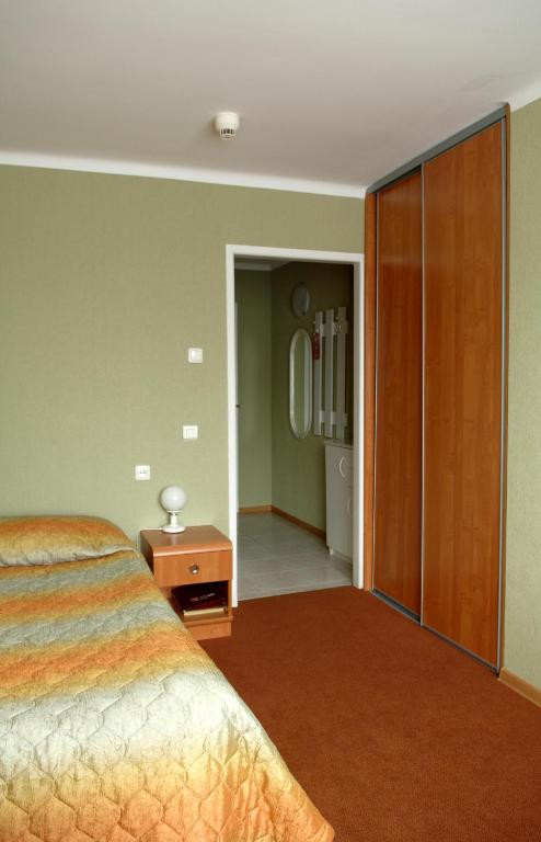 Posteľ alebo postele v izbe v ubytovaní Hotel Mazowiecki Łódź