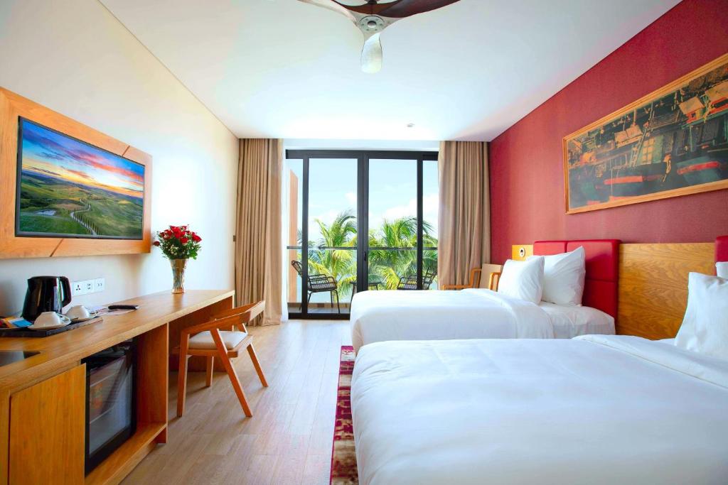 Phòng Deluxe 2 giường đơn với ban công