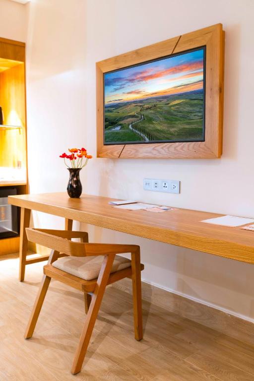 Bungalow Premier Giường Đôi Có Ban Công Hướng Vườn