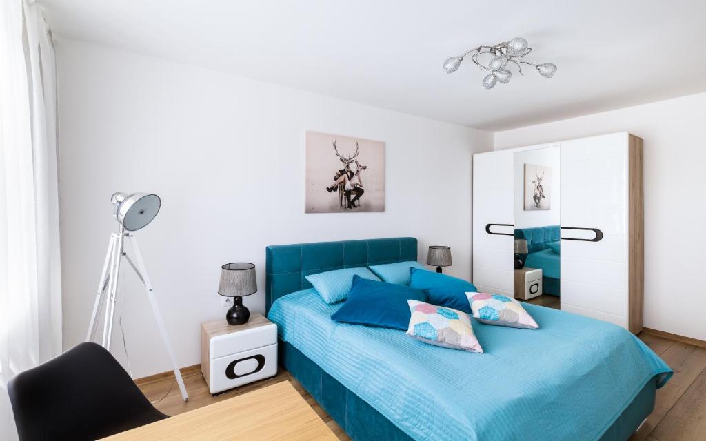 Posteľ alebo postele v izbe v ubytovaní Apartament Stag Karkonosz - 2 osobne pokoje - 38m2