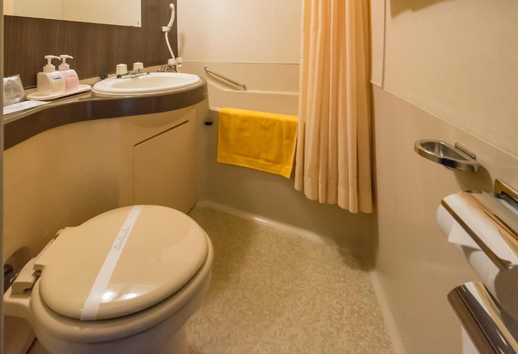 Koupelna v ubytování Oka Hotel