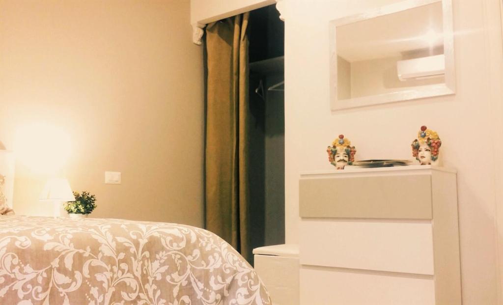 Posteľ alebo postele v izbe v ubytovaní Casa Cleone