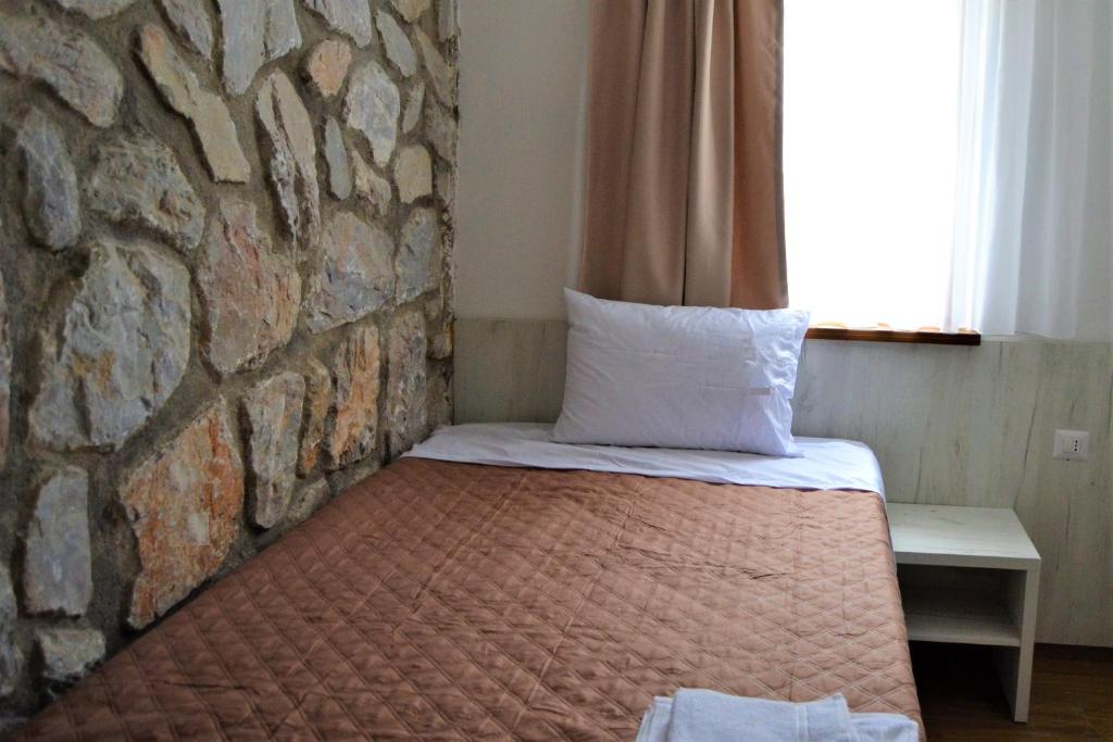 Postel nebo postele na pokoji v ubytování Hotel La Terrazza