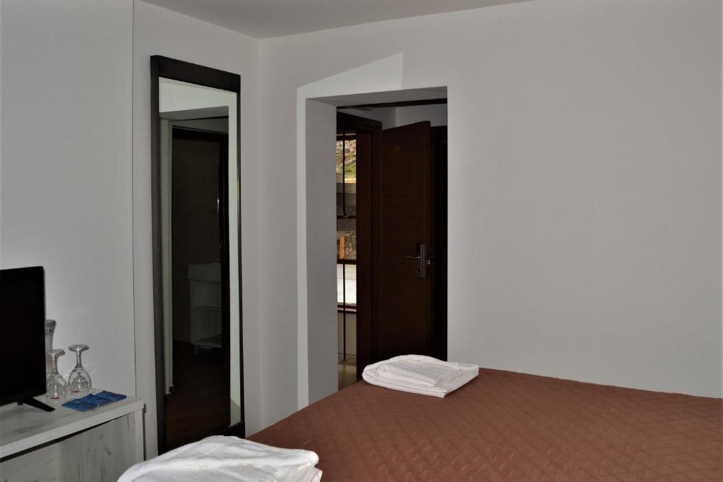 Postel nebo postele na pokoji v ubytování Hotel La Terrazza