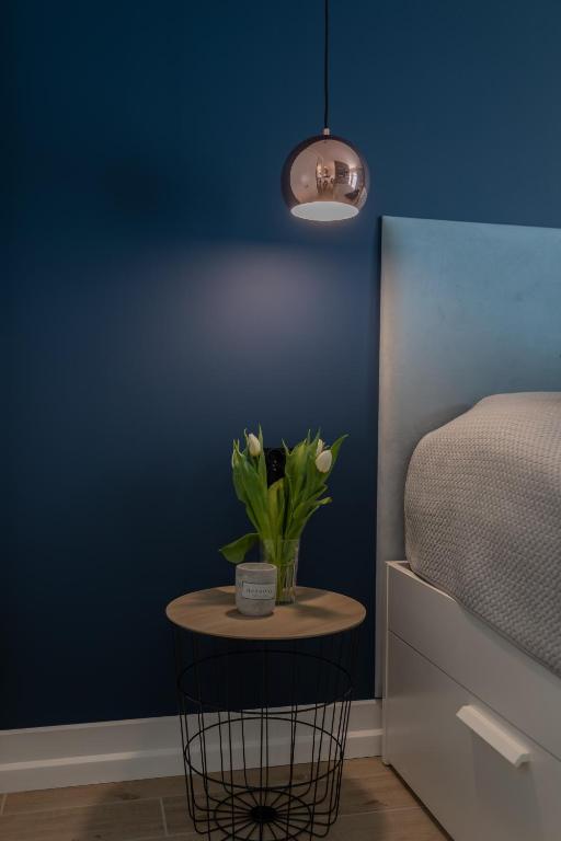 Posteľ alebo postele v izbe v ubytovaní Apartament CLIF