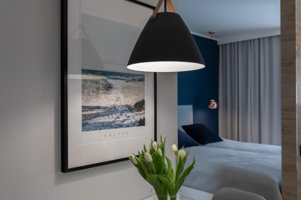 Posteľ alebo postele v izbe v ubytovaní Apartament CLIF