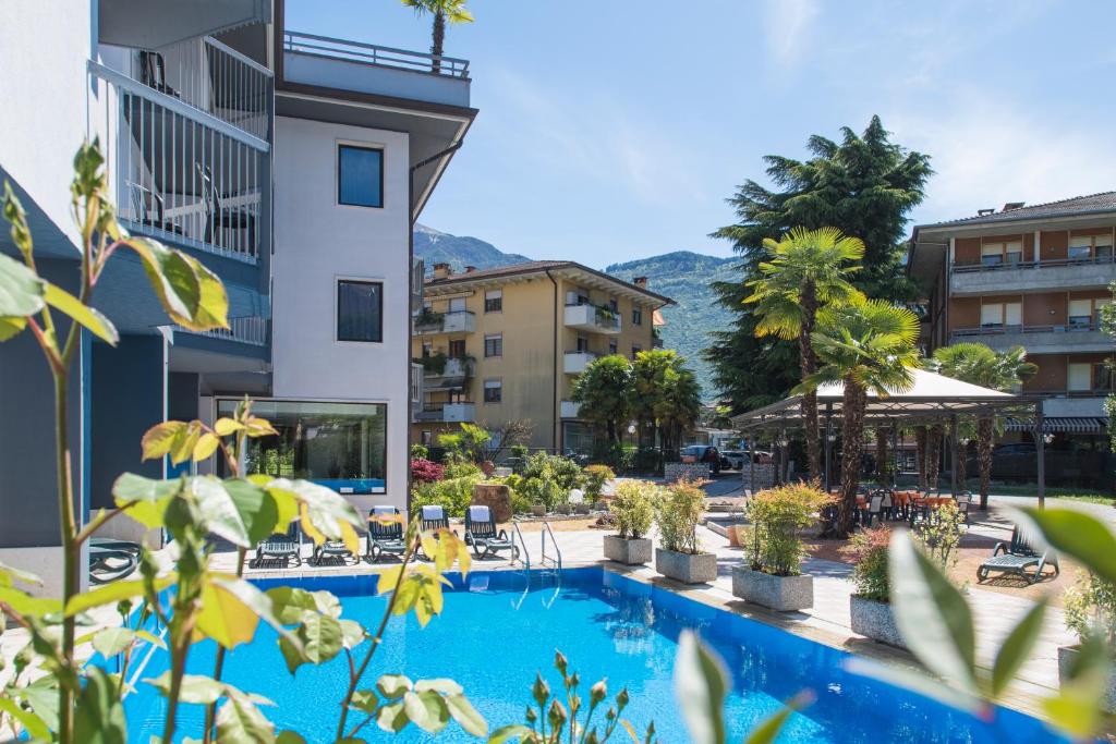a view of a hotel with a swimming pool at Arco Smart Hotel in Arco