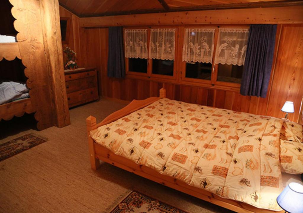 Voodi või voodid majutusasutuse Au Petit Gîte Les Paccots toas