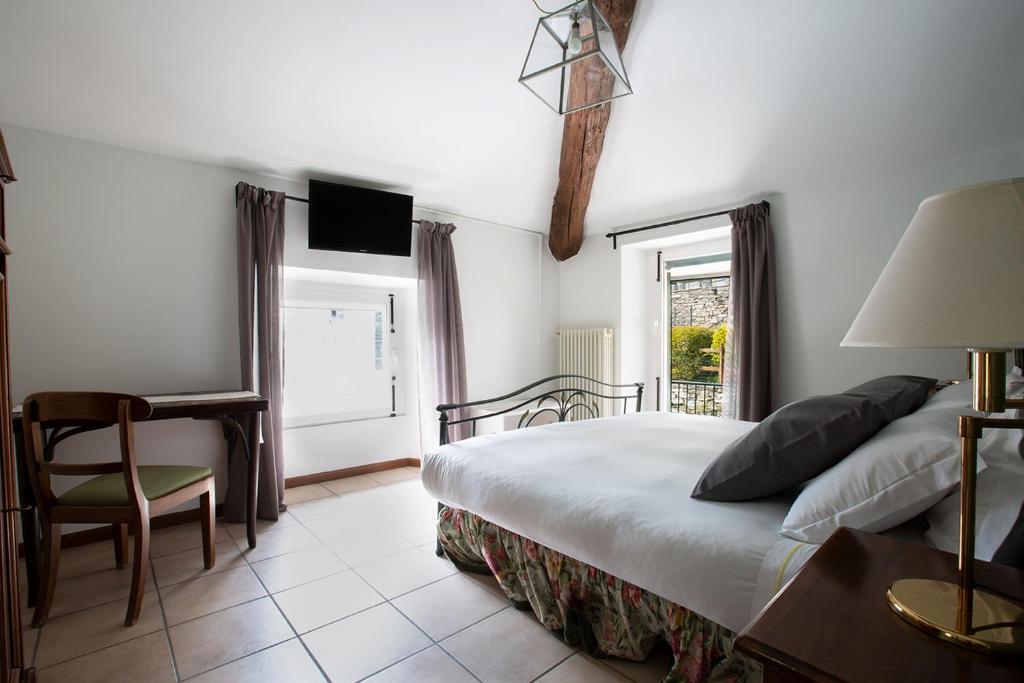 TV a/nebo společenská místnost v ubytování Hotel Orso Bruno