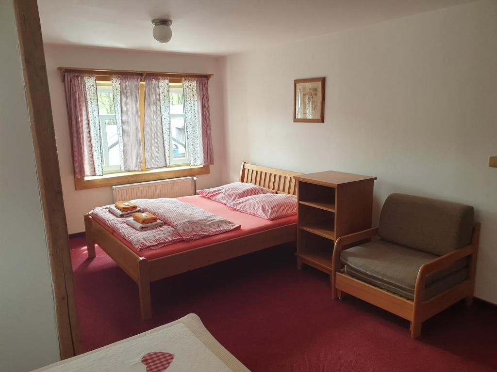 Postel nebo postele na pokoji v ubytování Penzion Marienka