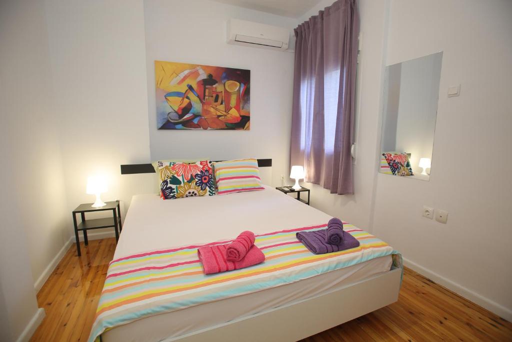 Postel nebo postele na pokoji v ubytování Central Studio Flat