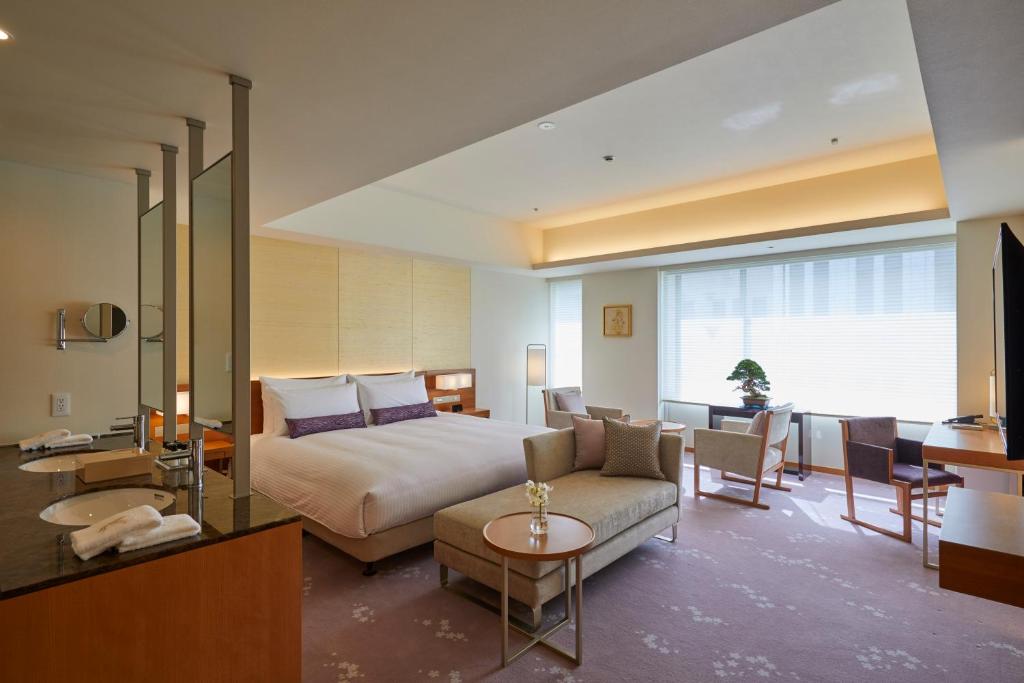 Postel nebo postele na pokoji v ubytování THE KITANO HOTEL TOKYO
