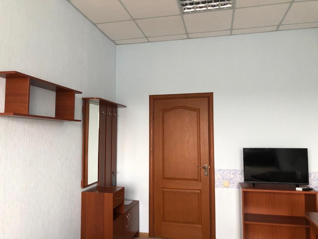 TV a/nebo společenská místnost v ubytování Mini Hotel on Brovarskaya