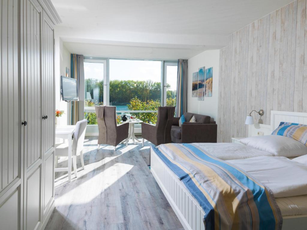 Postel nebo postele na pokoji v ubytování Hotel Deutscher Kaiser