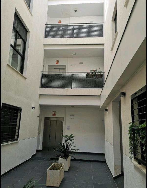 Balkon lub taras w obiekcie Stylish Apartment in the heart of Málaga with Pool