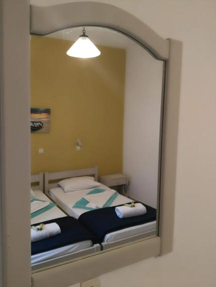 Una cama o camas en una habitación de Studios Iris