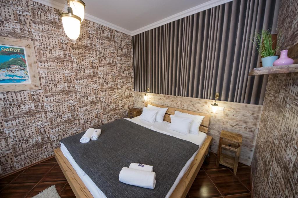 Postel nebo postele na pokoji v ubytování Platan Garden Rooms & Restaurant