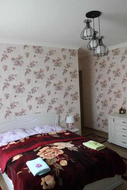 Postel nebo postele na pokoji v ubytování Giorgi's Homestay