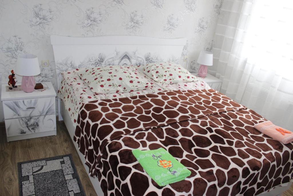 Postel nebo postele na pokoji v ubytování Giorgi's Homestay