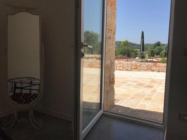 Balkón nebo terasa v ubytování Trulli da Lalli