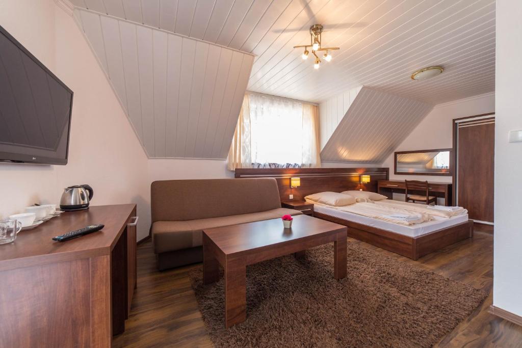Telewizja i/lub zestaw kina domowego w obiekcie Malwa