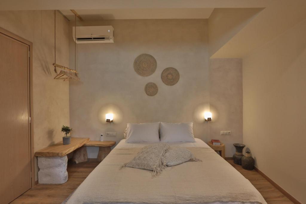 Postel nebo postele na pokoji v ubytování Ederlezi Boutique Hotel