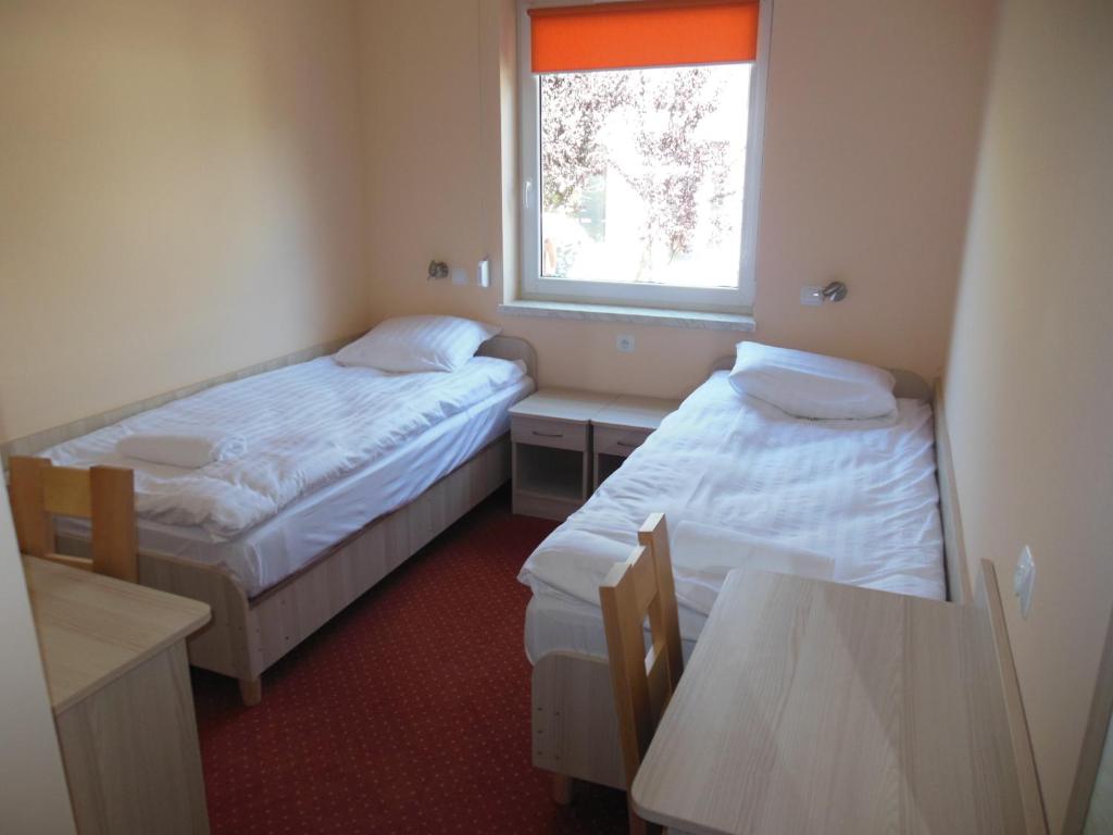 Postel nebo postele na pokoji v ubytování Hostel Żywiec
