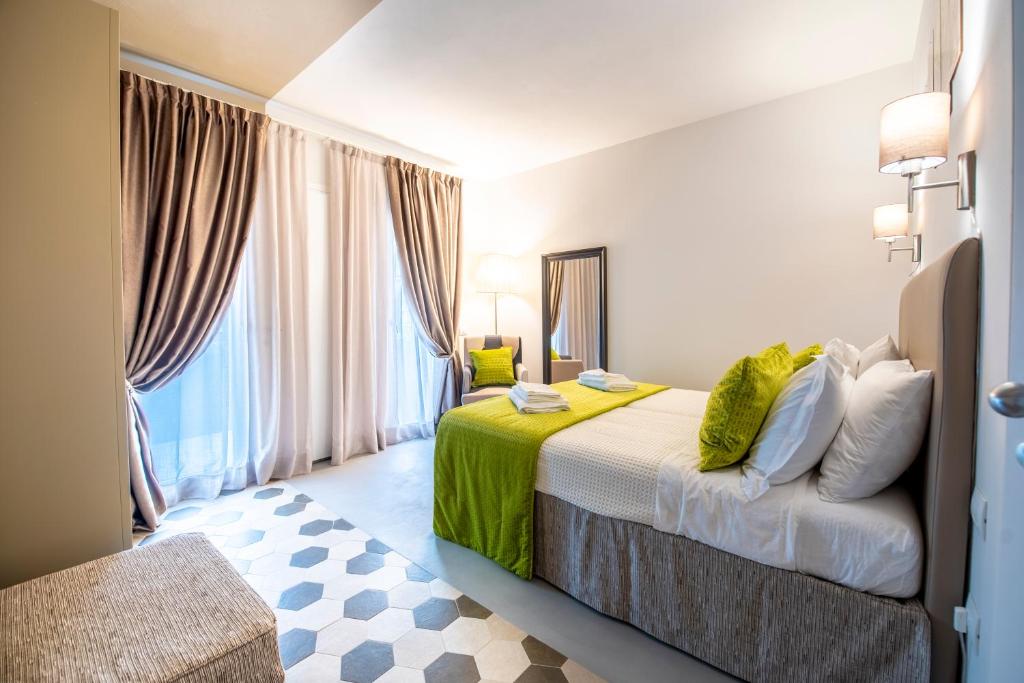 Postel nebo postele na pokoji v ubytování Casa Ercoli B&B
