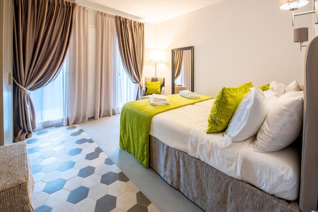 Postel nebo postele na pokoji v ubytování Casa Ercoli B&B