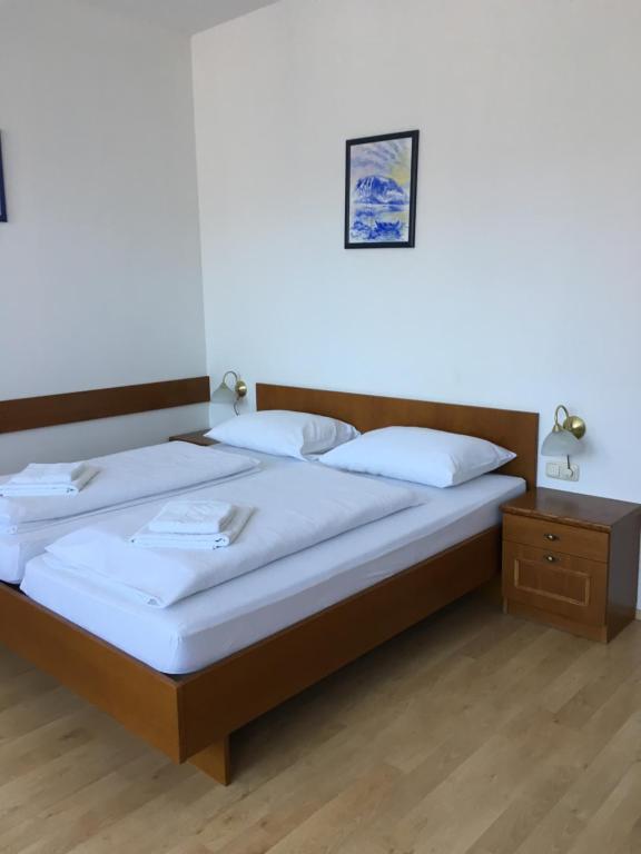 Postel nebo postele na pokoji v ubytování Sporthotel am Ötscher