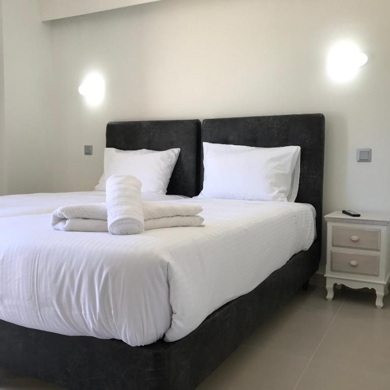 Postel nebo postele na pokoji v ubytování The Little Prince Luxury Suites