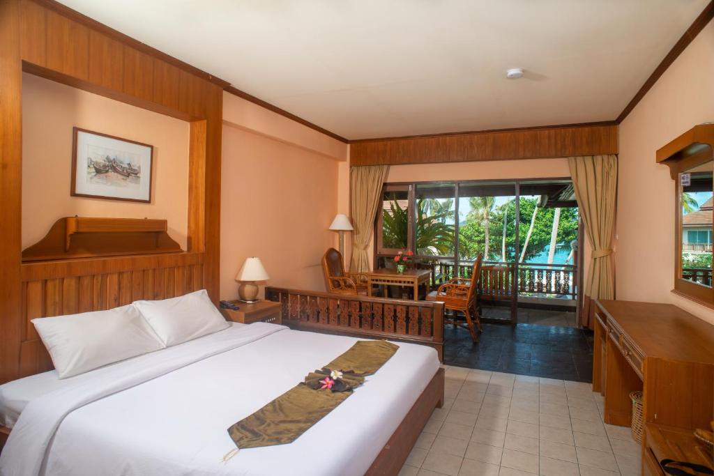 Postel nebo postele na pokoji v ubytování Aloha Resort