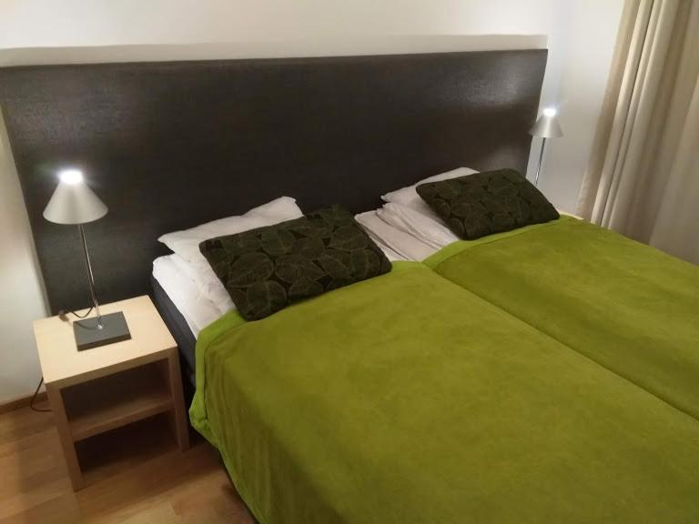 Кровать или кровати в номере Apartment Ylläs Ski Chalets 7202, Incl 2 lift tickets in winter season