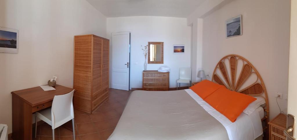 Postel nebo postele na pokoji v ubytování Albergo Seaside