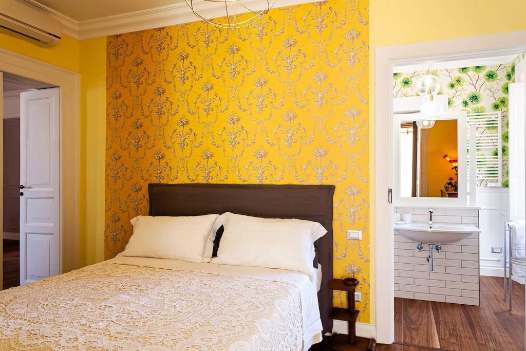 Łóżko lub łóżka w pokoju w obiekcie Interno Sorrentino