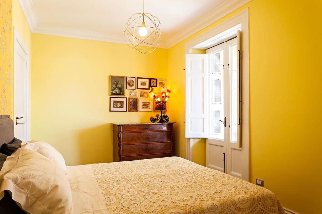 Łóżko lub łóżka w pokoju w obiekcie Interno Sorrentino