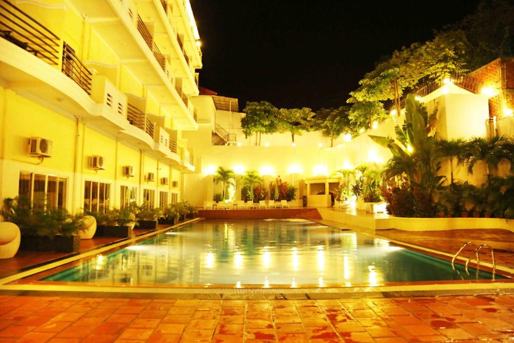 
The swimming pool at or near Serendipity Beach Resort
