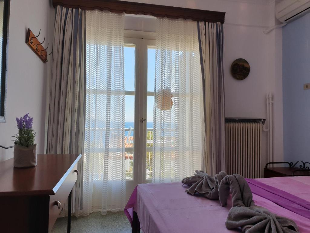 Postel nebo postele na pokoji v ubytování Seaside Villa