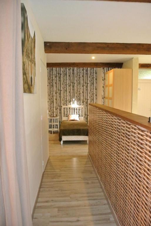 Postel nebo postele na pokoji v ubytování La Fresnée chambres d'hôtes