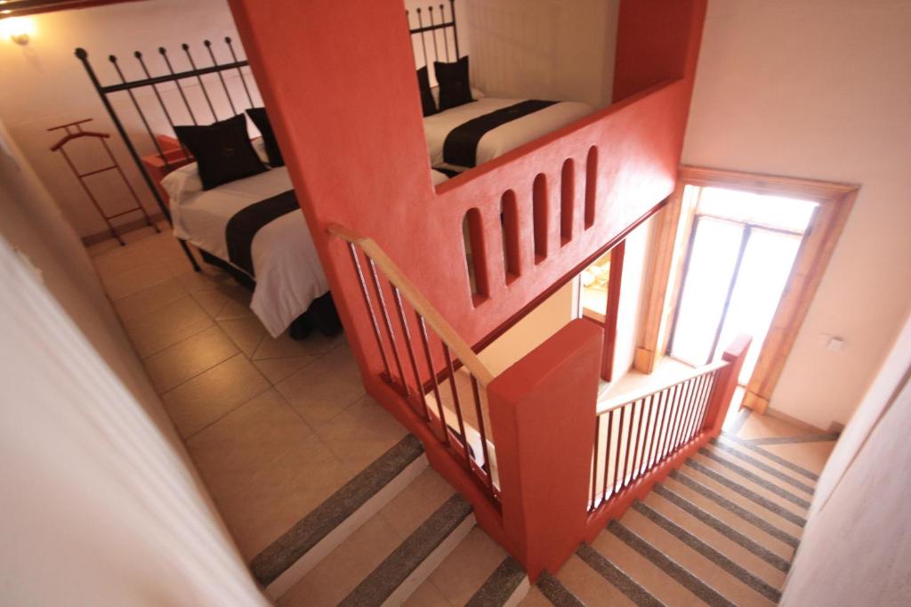 Postel nebo postele na pokoji v ubytování Hotel Santa Regina