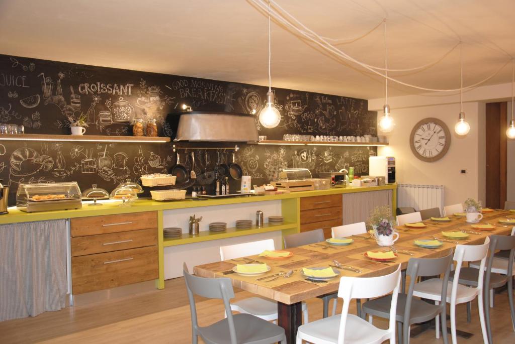 Reštaurácia alebo iné gastronomické zariadenie v ubytovaní Agriturismo Villa Le Vigne