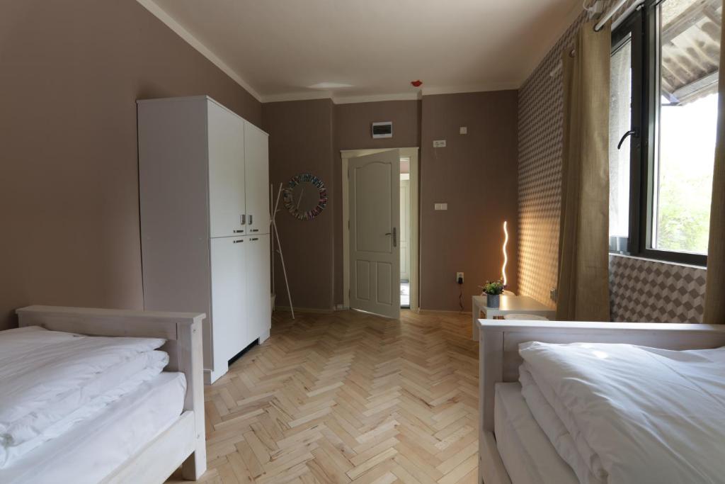 Postel nebo postele na pokoji v ubytování Hostel Kyosheto