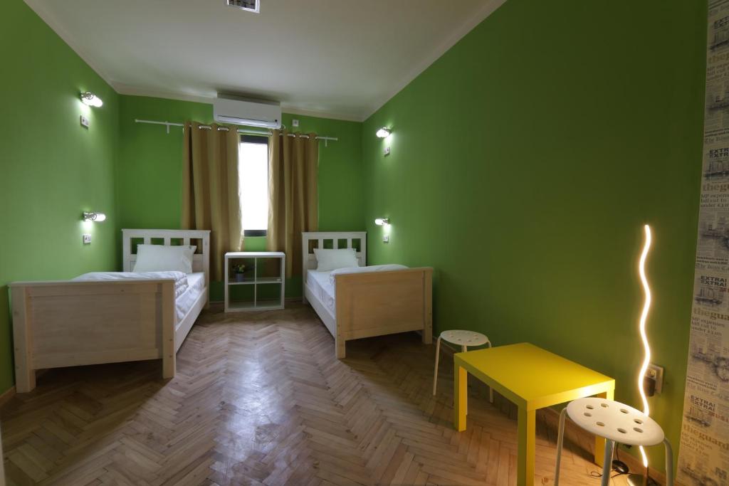 Postel nebo postele na pokoji v ubytování Hostel Kyosheto