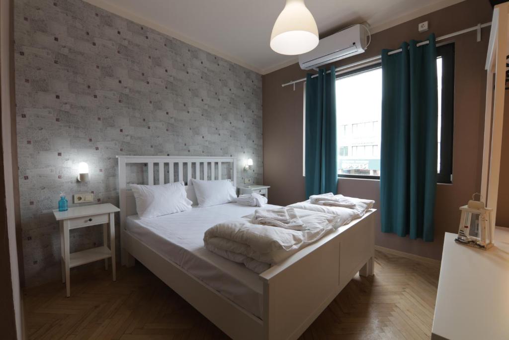 Postel nebo postele na pokoji v ubytování Hostel Kyosheto