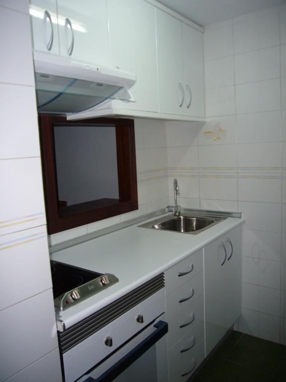 Kuchyňa alebo kuchynka v ubytovaní Apartamentos Gemelos IV - Fincas Arena